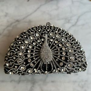Peacock gemstone clutch